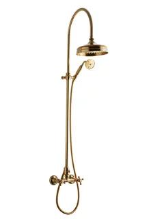 Mässingsfärgad takdusch med böjd stång, rund duschhuvud och separat handdusch.