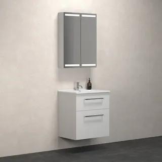 Vitt badrumsmöbelset med spegelskåp och två lådor, monterat på vägg.