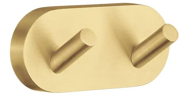 Dubbellkrok i mattborstad mässing med två utstickande cylindriska armar på en oval bakgrund.