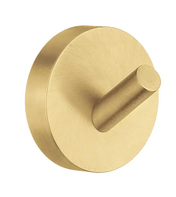 Rund krok i mattborstad mässing med ett cylindriskt utstick från en cirkulär platta.